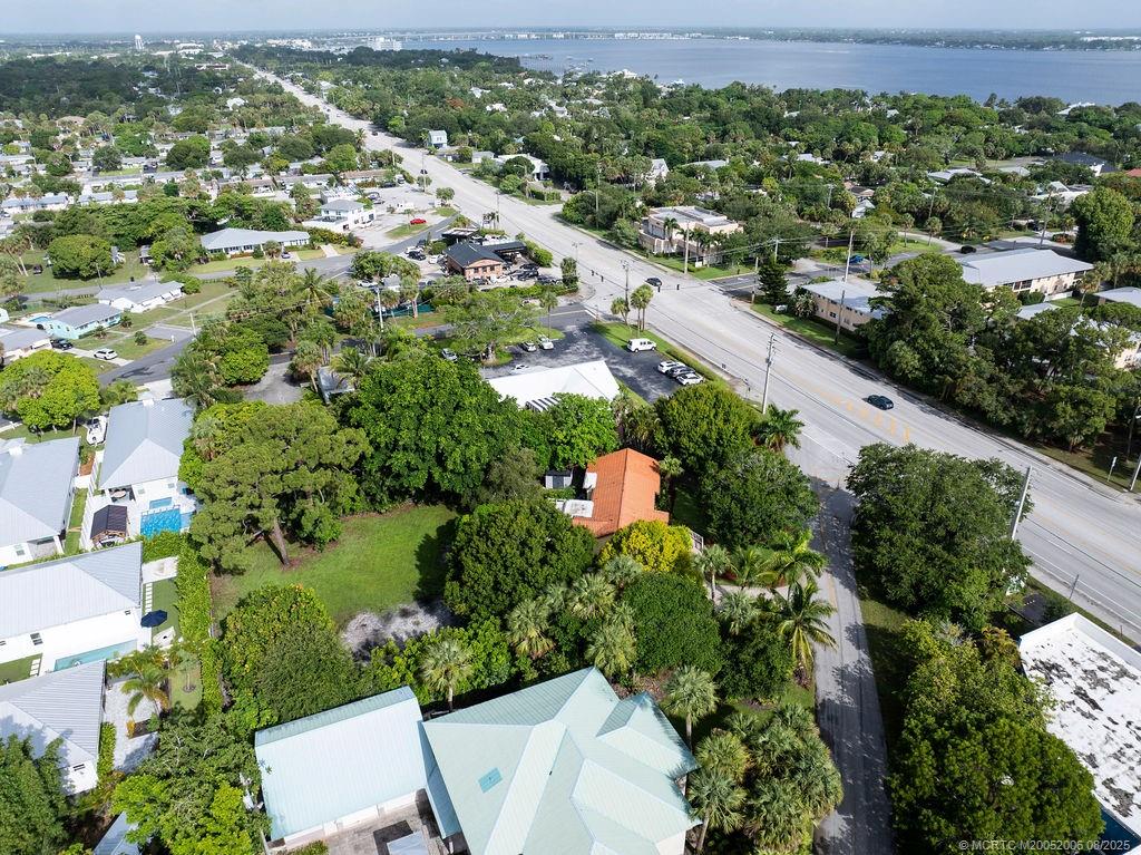 400 Southeast Flamingo Avenue Stuart, FL 34996 - Photo 27 of 33 an aerial view of a city with lots of residential buildings