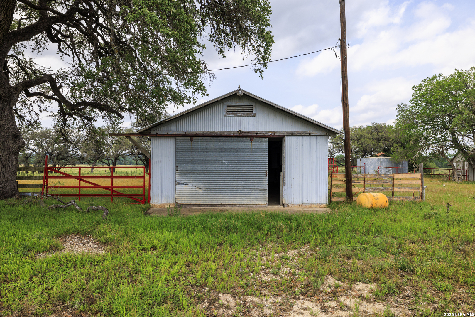 0 Comfort River Ranch Comfort, TX 78013 - Photo 18 of 23 a front view of house with yard and trees