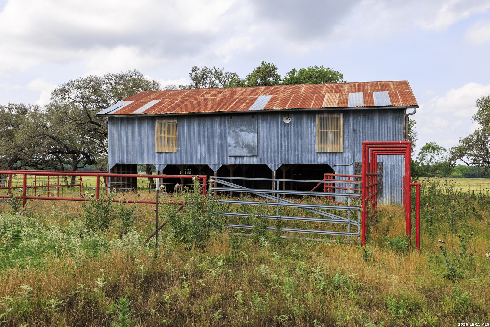 0 Comfort River Ranch Comfort, TX 78013 - Photo 19 of 23 a backyard of a house with table and chairs