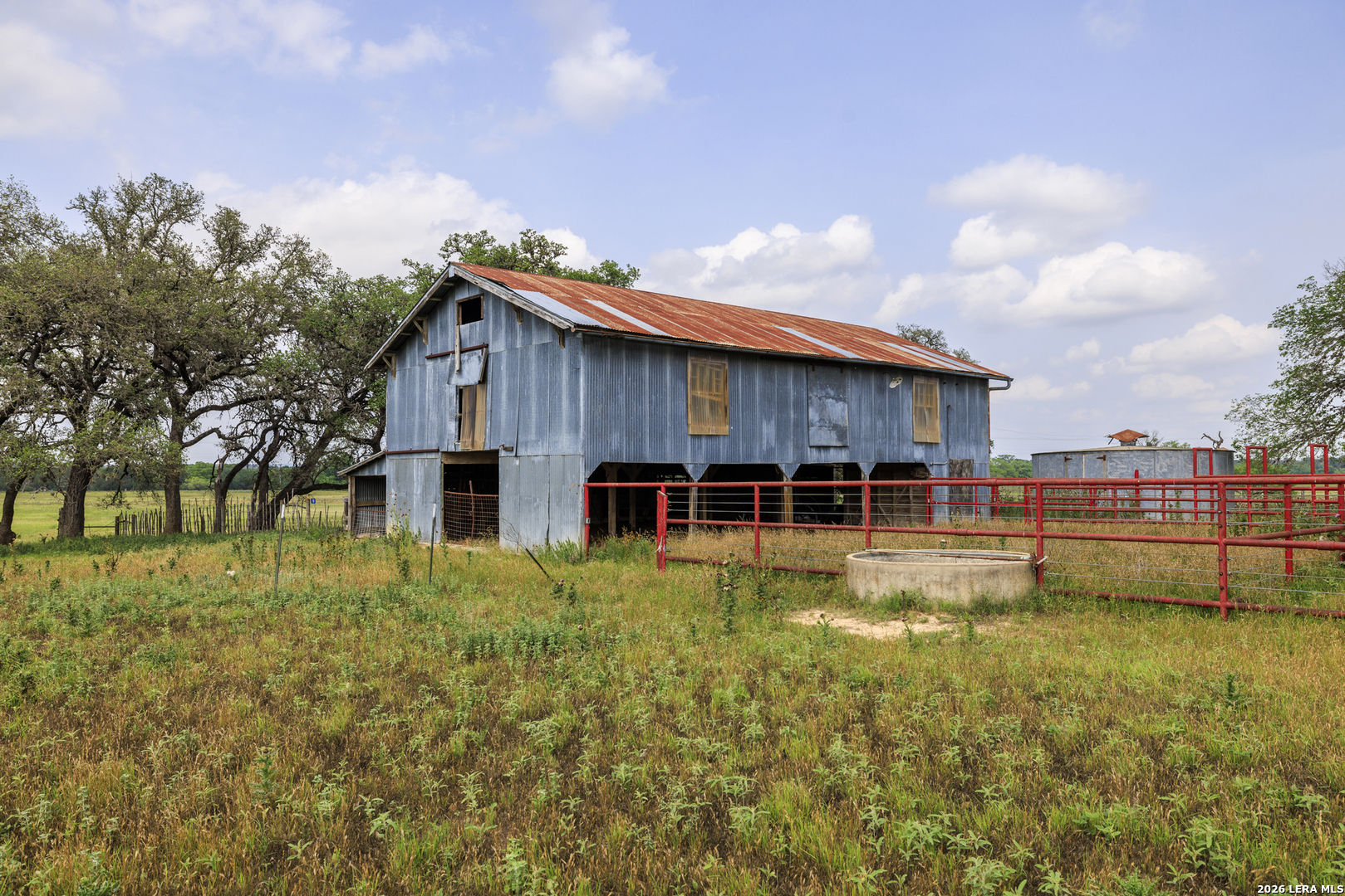 0 Comfort River Ranch Comfort, TX 78013 - Photo 3 of 23 a swimming pool view with a seating space and a garden view