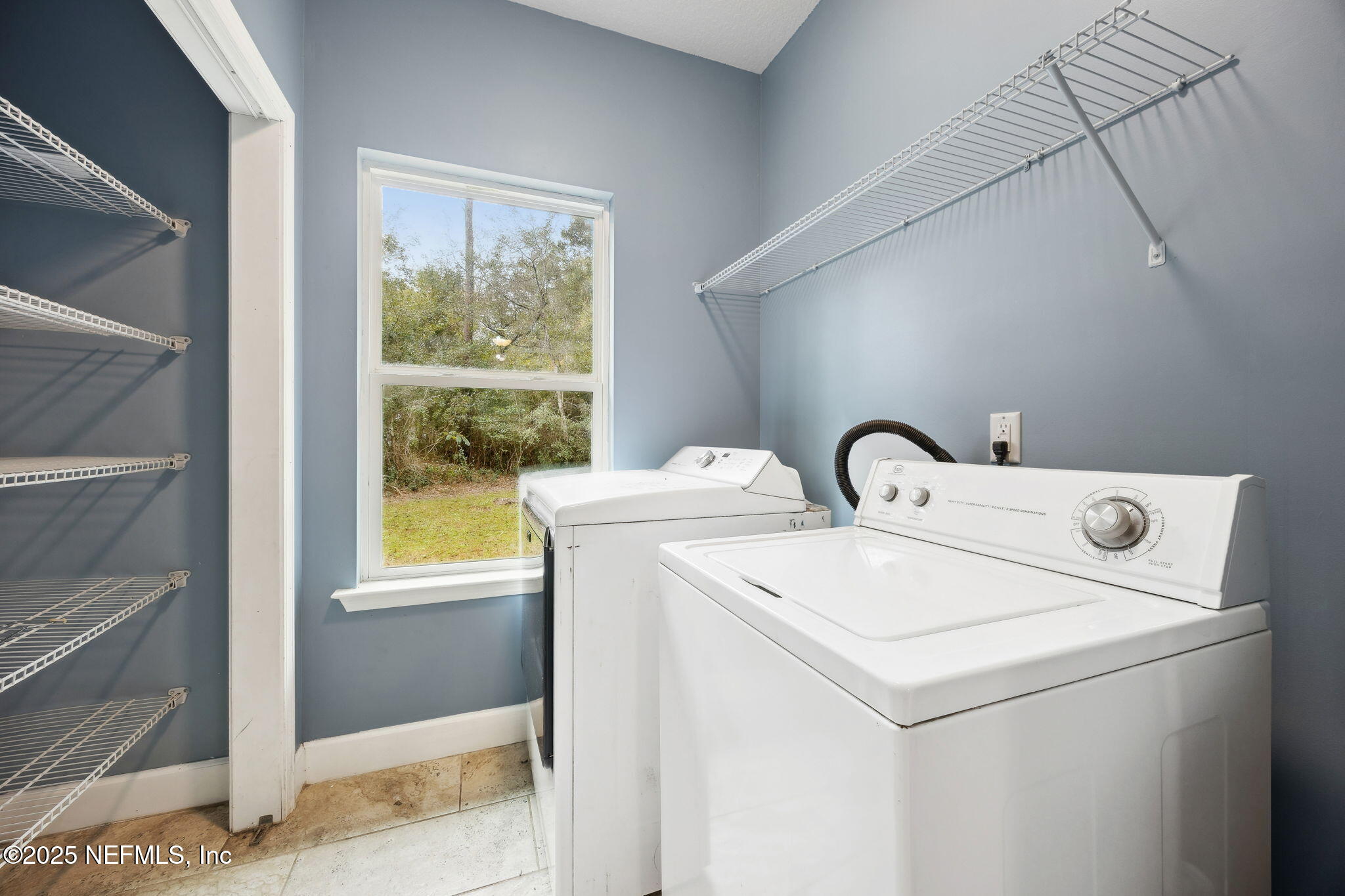 85484 Miner Road Yulee, FL 32097 - Photo 33 of 38 a utility room with dryer and washer