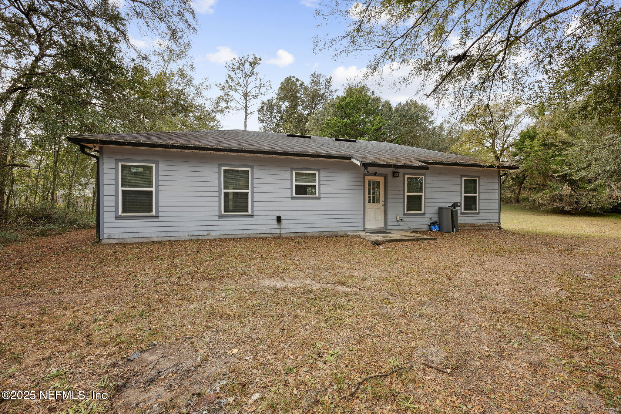 85484 Miner Road Yulee, FL 32097 - Photo 35 of 38 a house with trees in the background