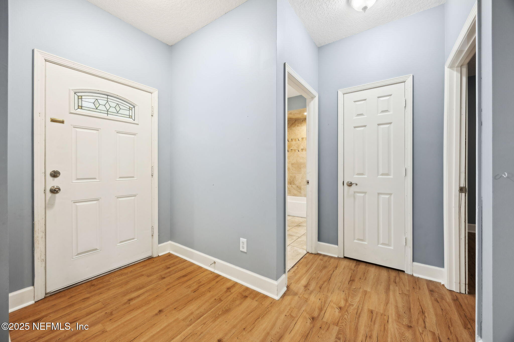 85484 Miner Road Yulee, FL 32097 - Photo 6 of 38 a view of a room with wooden floor