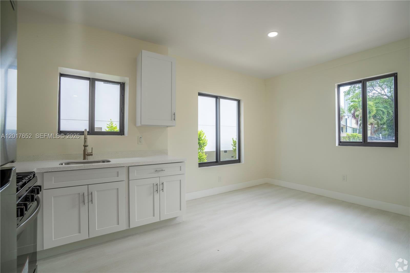 433 Southwest 6th Street, Unit 15 Miami, FL 33130 - Photo 10 of 12 a bathroom with a sink and a window