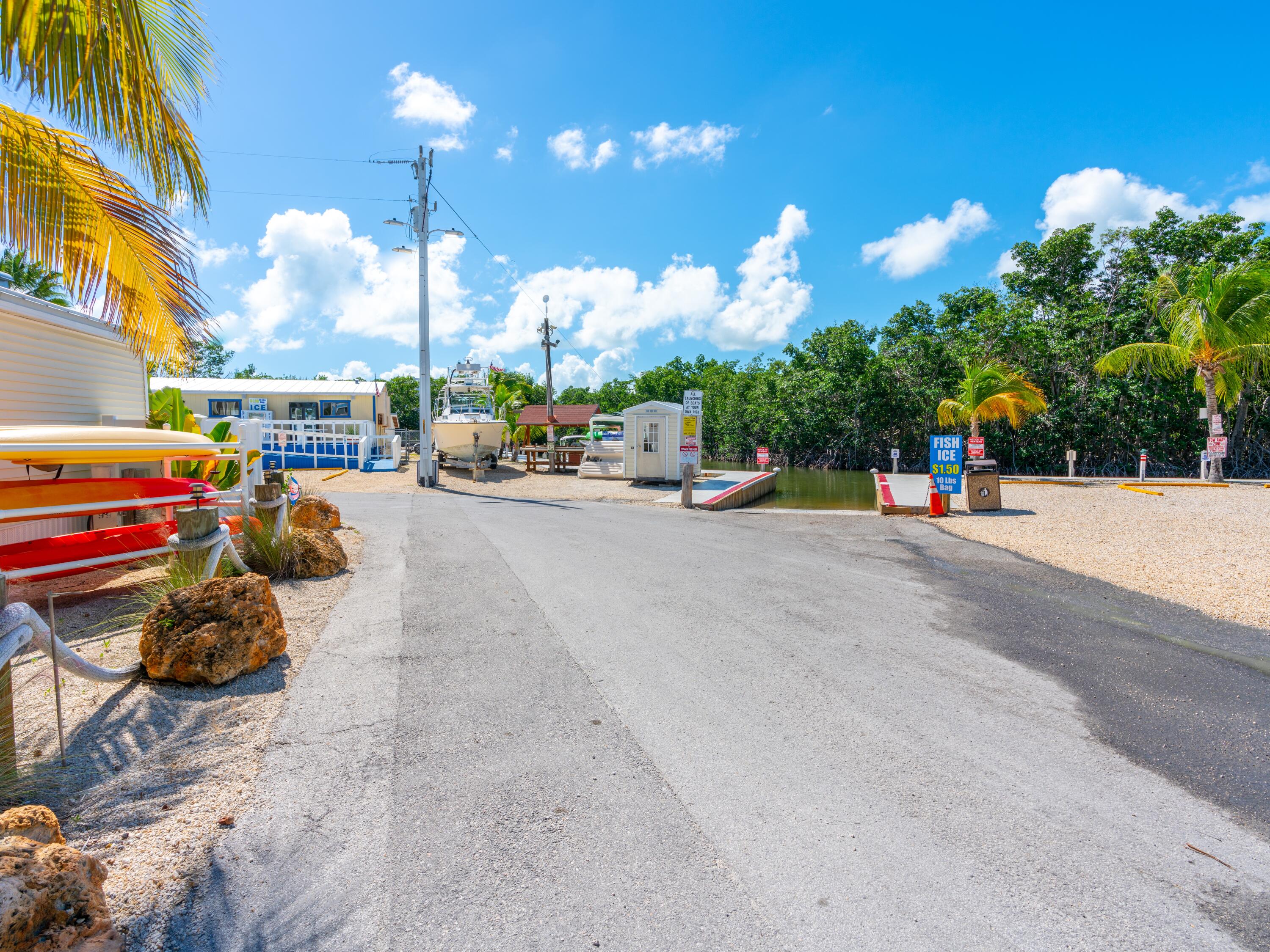325 Calusa Street, Unit 78 Key Largo, FL 33037 - Photo 21 of 24 a view of a street with cars