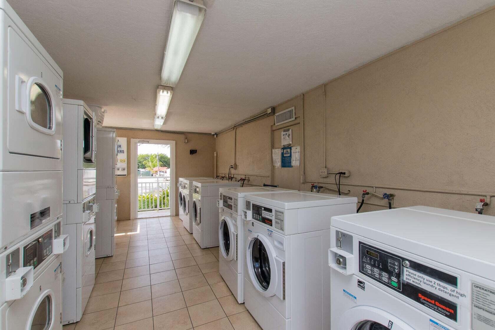 325 Calusa Street, Unit 78 Key Largo, FL 33037 - Photo 10 of 24 a utility room with dryer and washer