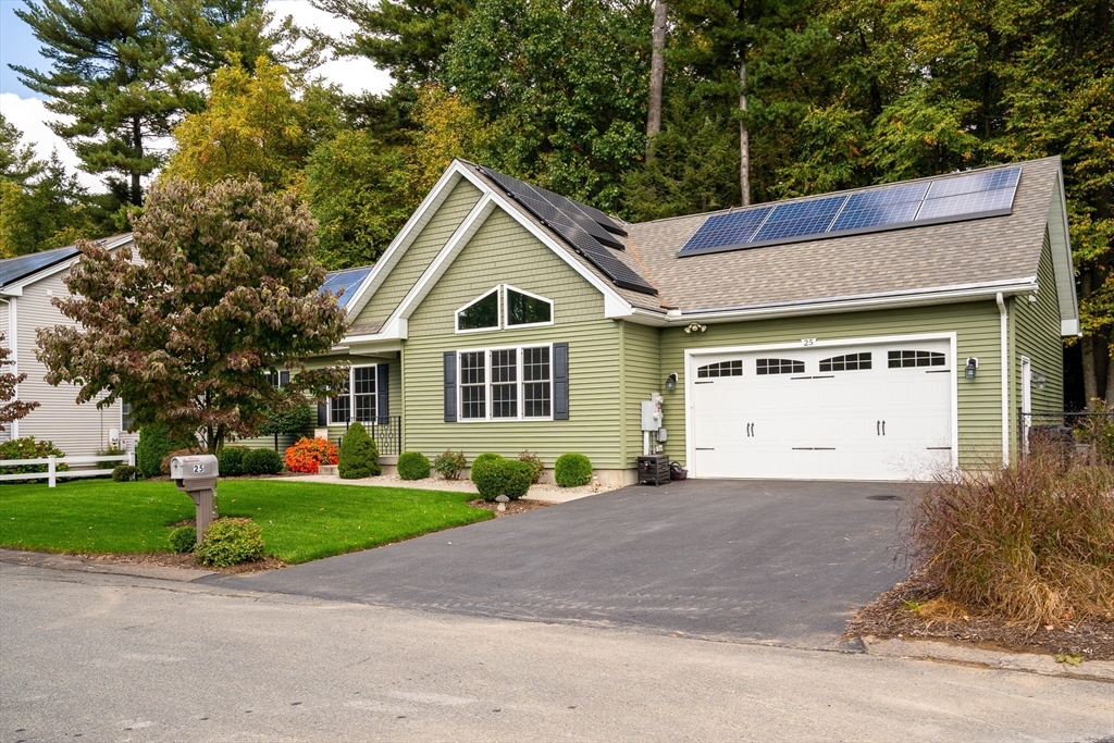 25 Paul Street Easthampton, MA 01027 - Photo 2 of 42 a view of a house with a yard and large tree
