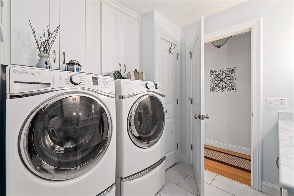 25 Paul Street Easthampton, MA 01027 - Photo 38 of 42 a utility room with dryer and washer