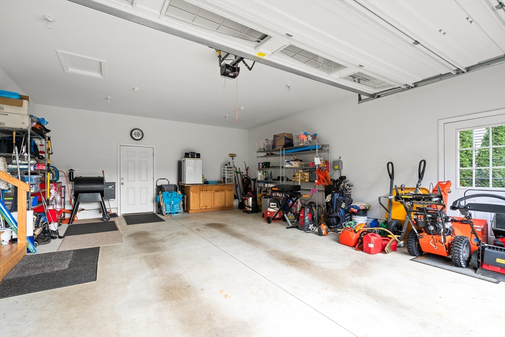 25 Paul Street Easthampton, MA 01027 - Photo 42 of 42 a view of a garage with a bike and car