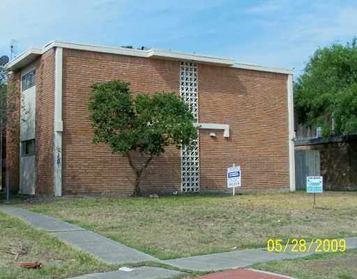a brick building with a large door
