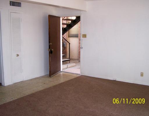 4609 Gollihar Road, Unit 1 Corpus Christi, TX 78411 - Photo 4 of 10 a view of a hallway
