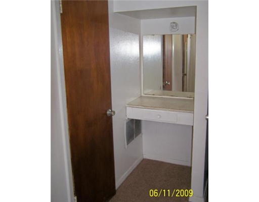 4609 Gollihar Road, Unit 1 Corpus Christi, TX 78411 - Photo 10 of 10 a view of cabinet and mirror