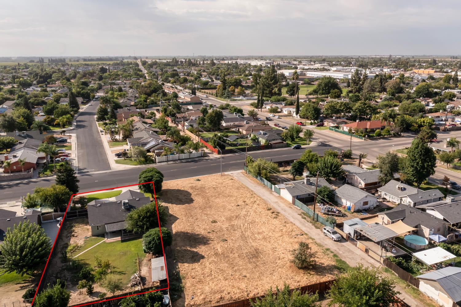 728 9th Street Sanger, CA 93657 - Photo 21 of 24 an aerial view of residential houses with outdoor space