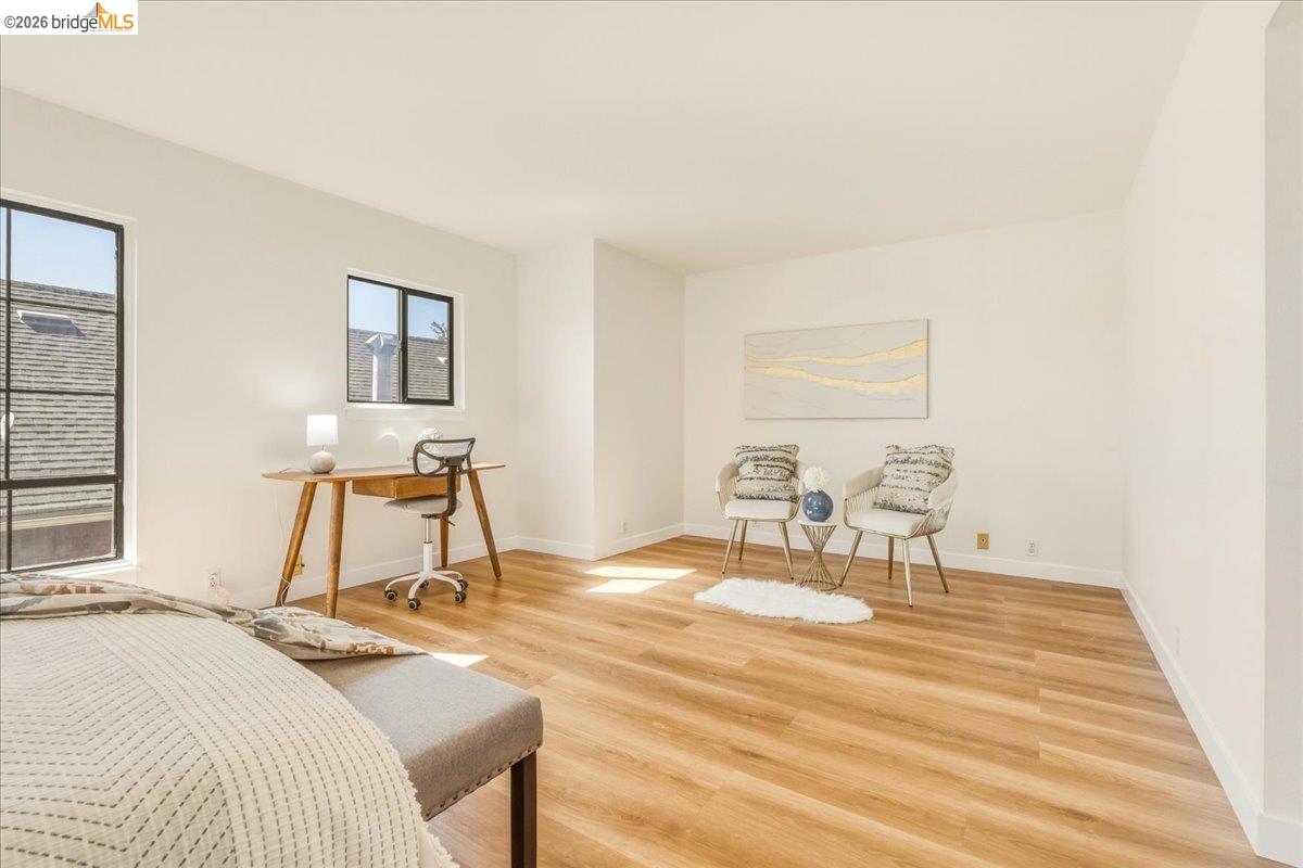 1408 Henry Street Berkeley, CA 94709 - Photo 15 of 28 Bedroom featuring light wood finished floors and baseboards