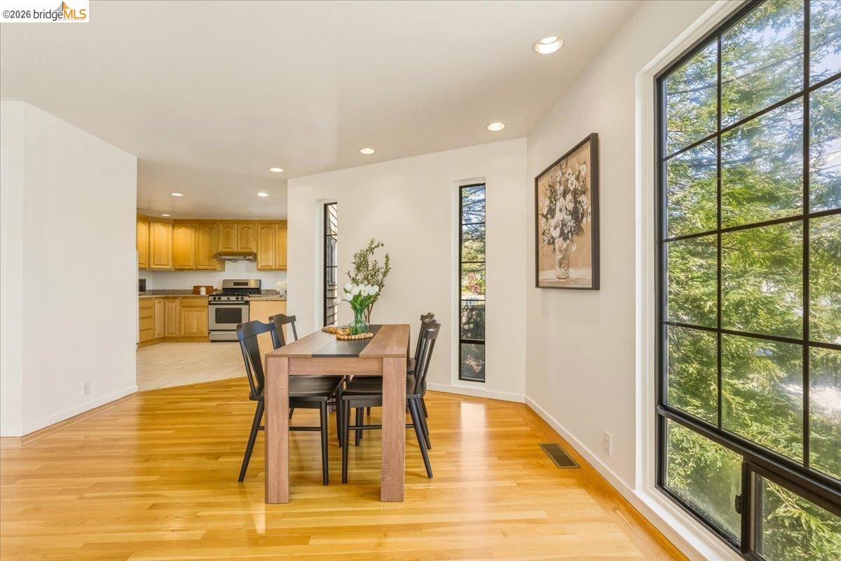1408 Henry Street Berkeley, CA 94709 - Photo 8 of 28 Dining space with recessed lighting and light wood-type flooring