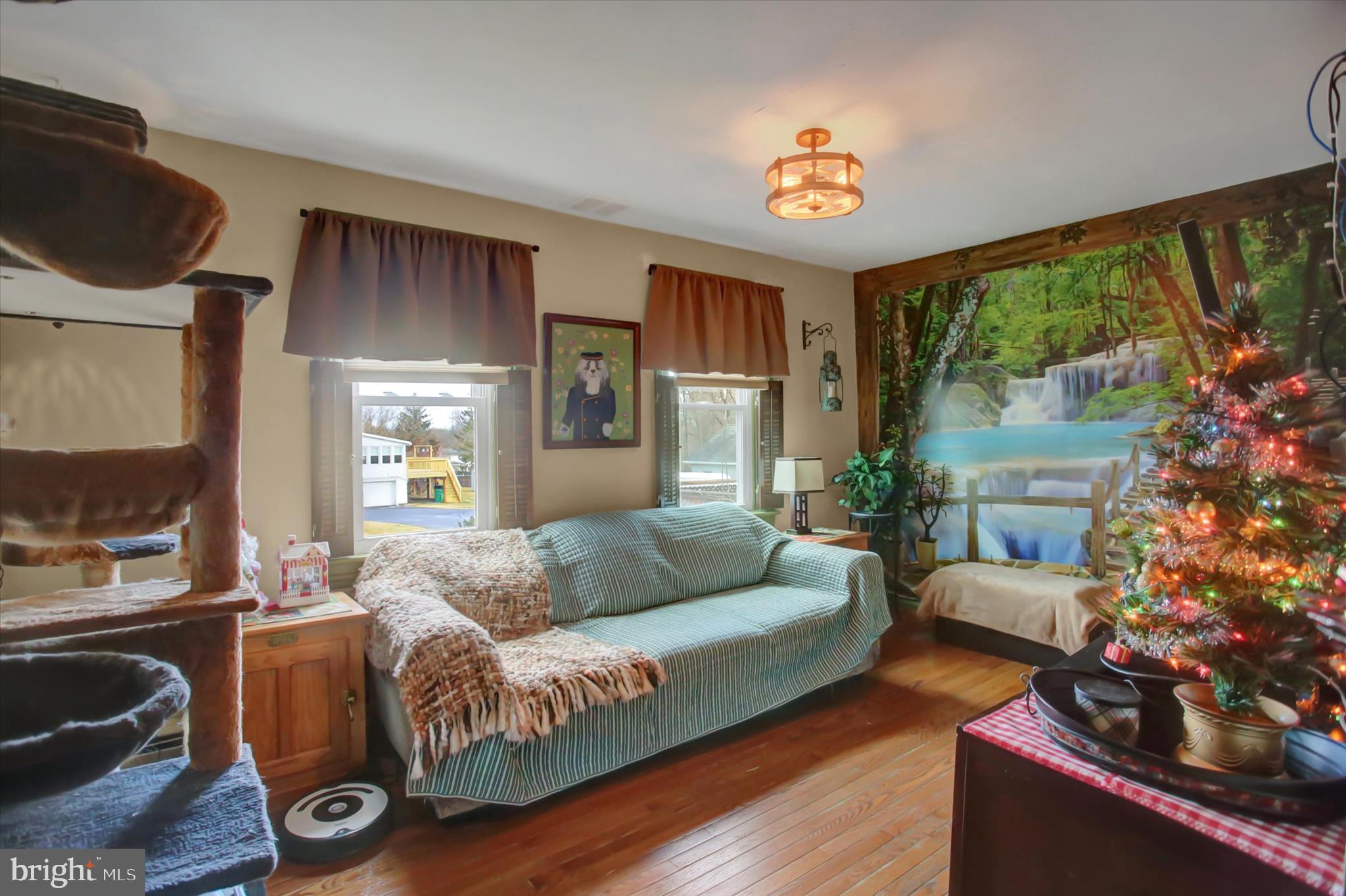 13422 Pennersville Road Waynesboro, PA 17268 - Photo 5 of 31 a living room with furniture and a large window