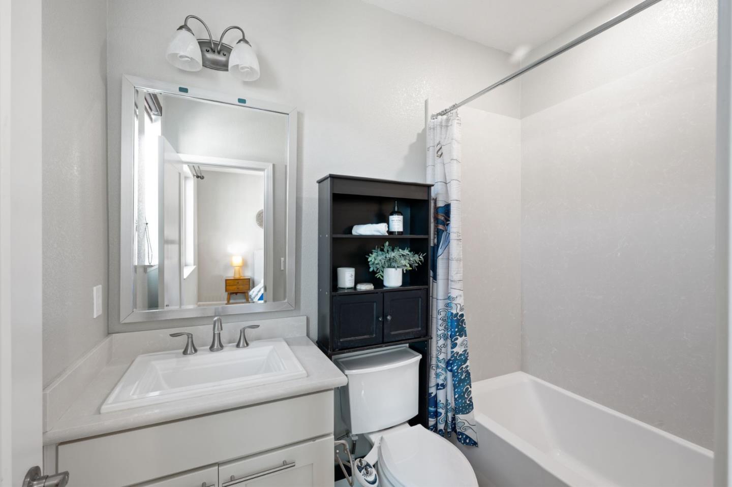 5977 Larkstone Loop San Jose, CA 95123 - Photo 35 of 63 a bathroom with a sink toilet and shower