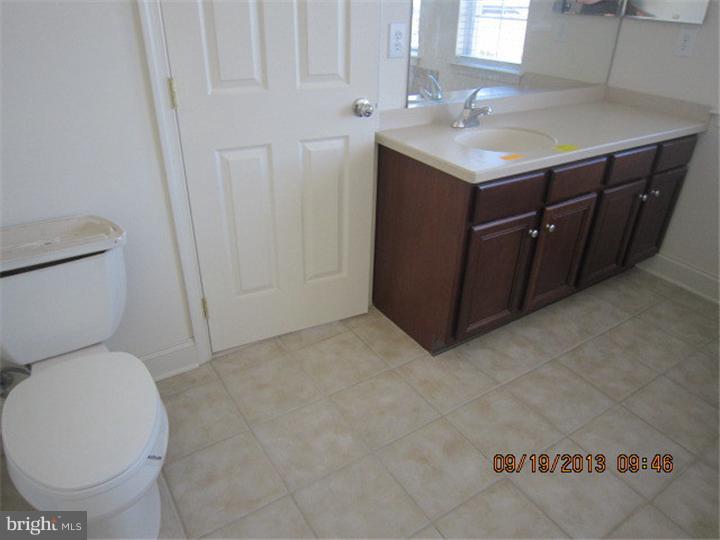 22 Bryce Road Berlin, NJ 08009 - Photo 13 of 17 a bathroom with a sink toilet and vanity
