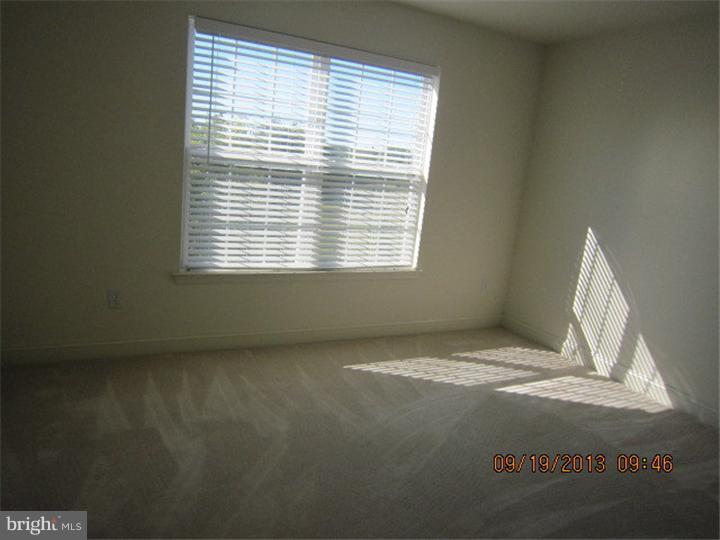 22 Bryce Road Berlin, NJ 08009 - Photo 15 of 17 a view of an empty room with a window