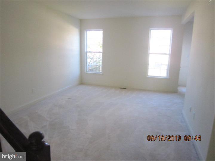 22 Bryce Road Berlin, NJ 08009 - Photo 4 of 17 an empty room with windows