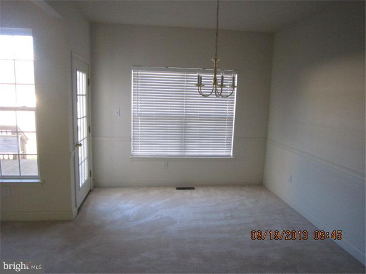 22 Bryce Road Berlin, NJ 08009 - Photo 5 of 17 an empty room with windows