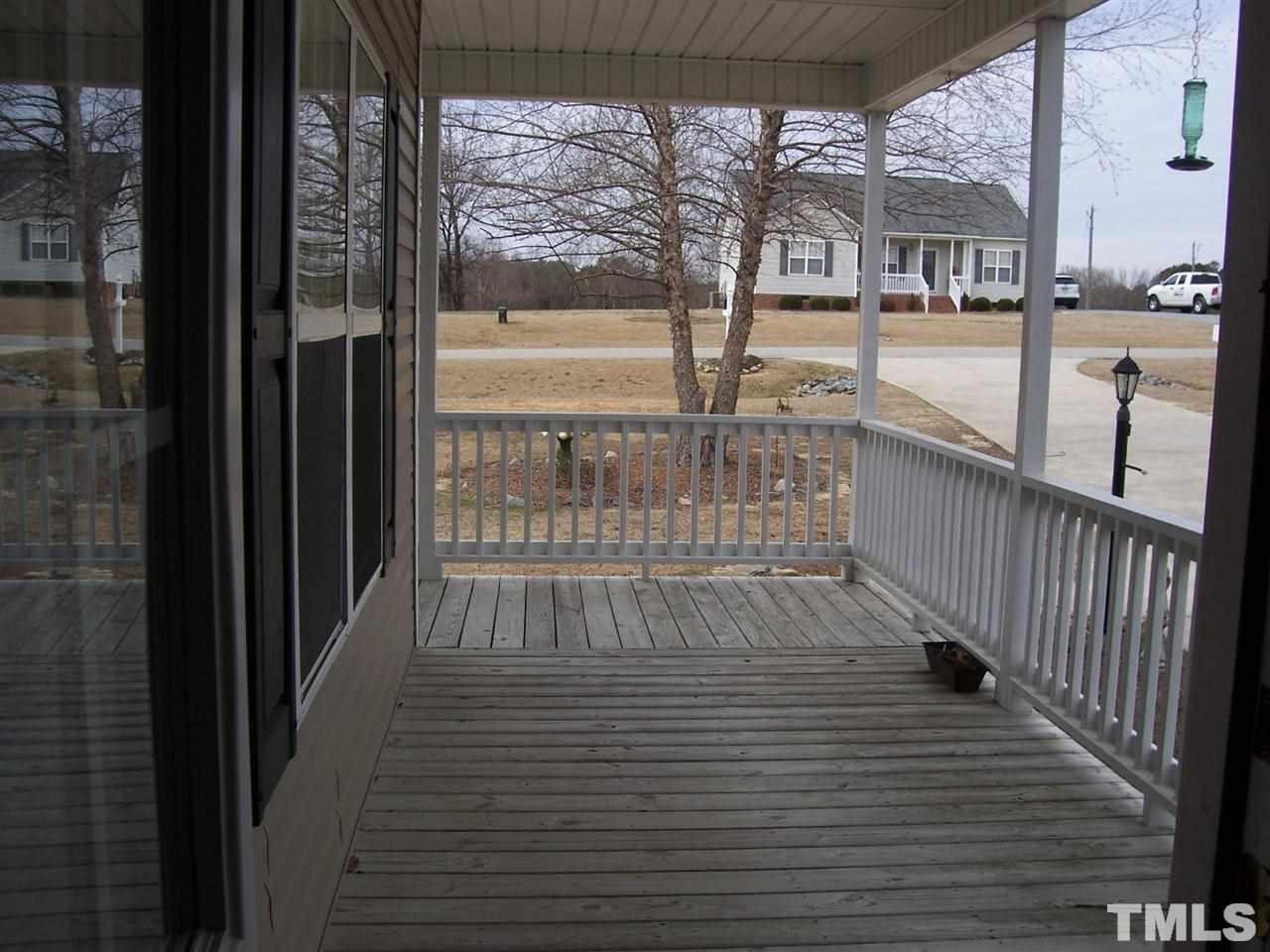 101 Sycamore Court Benson, NC 27504 - Photo 19 of 25 Wrap around porch
