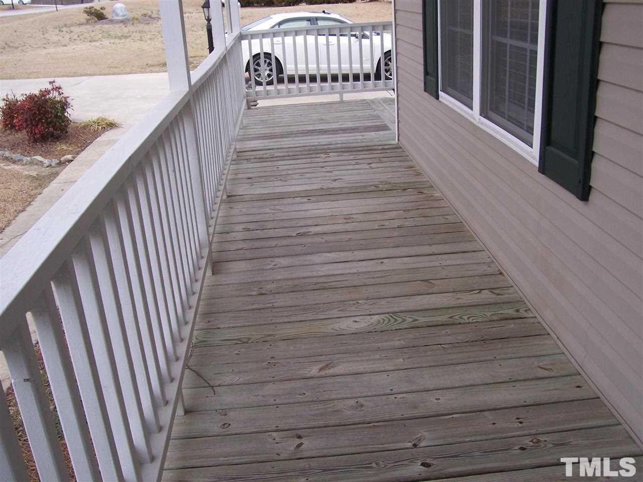 101 Sycamore Court Benson, NC 27504 - Photo 20 of 25 front porch is 5' wide and side porch is 8' wide.