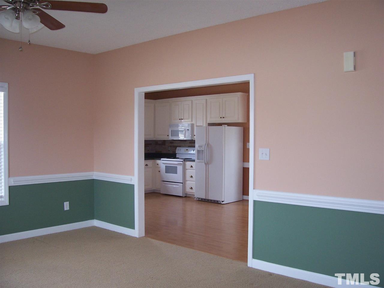 101 Sycamore Court Benson, NC 27504 - Photo 8 of 25 Living room open to kitchen dining room combination