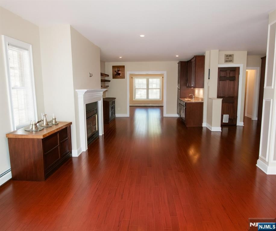 457 Elm Street Stirling, NJ 07980 - Photo 14 of 25 a living room with furniture and kitchen view