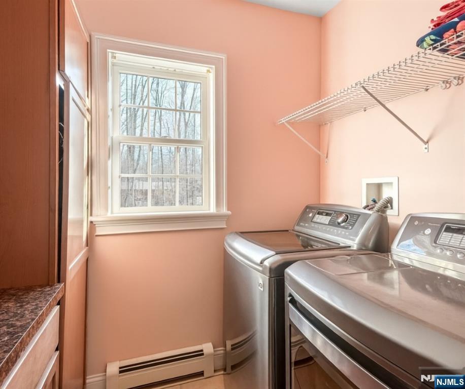 457 Elm Street Stirling, NJ 07980 - Photo 16 of 25 a utility room with dryer and washer