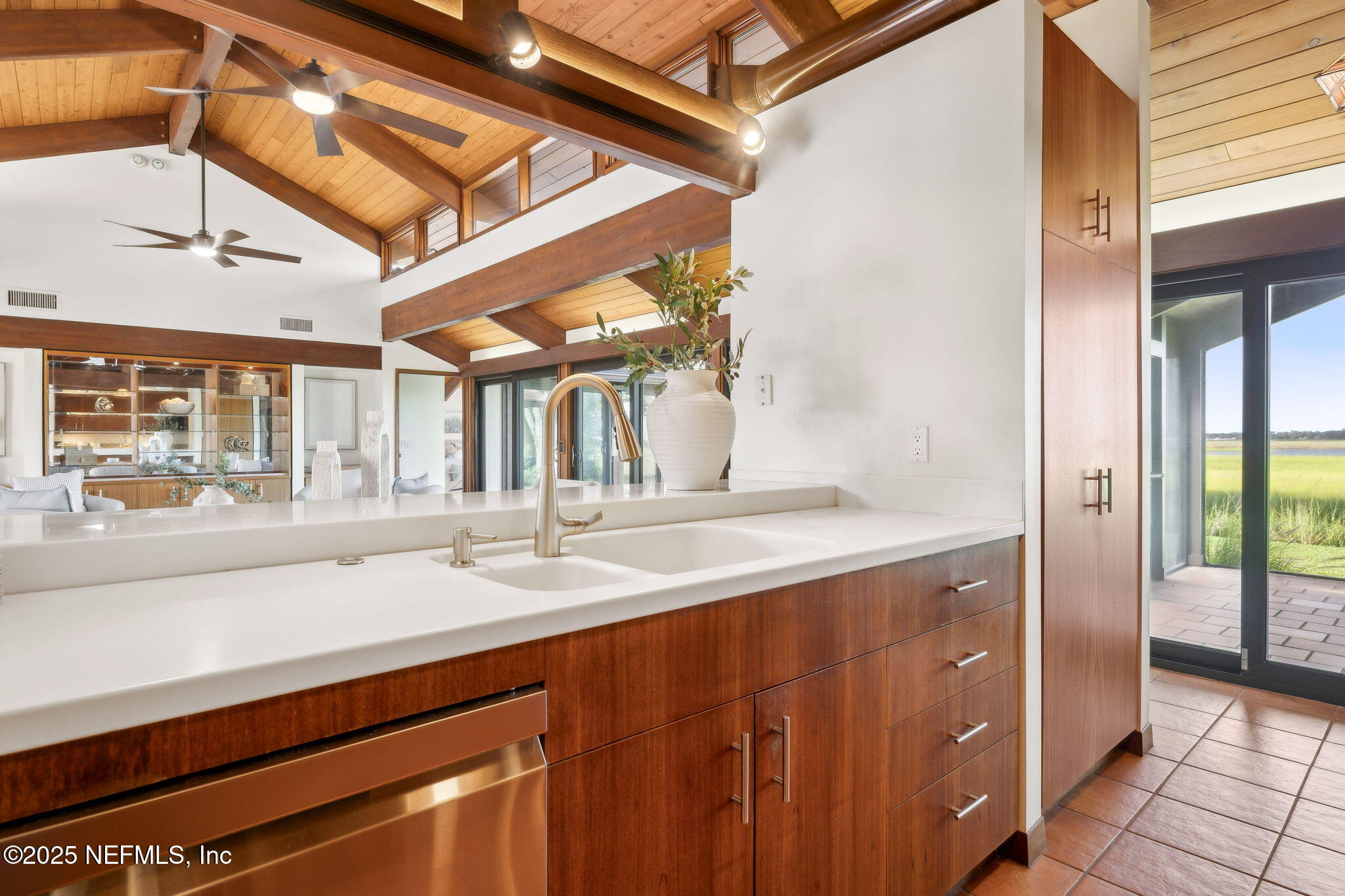83 Tallwood Road Jacksonville Beach, FL 32250 - Photo 18 of 66 a kitchen with a sink and a large window