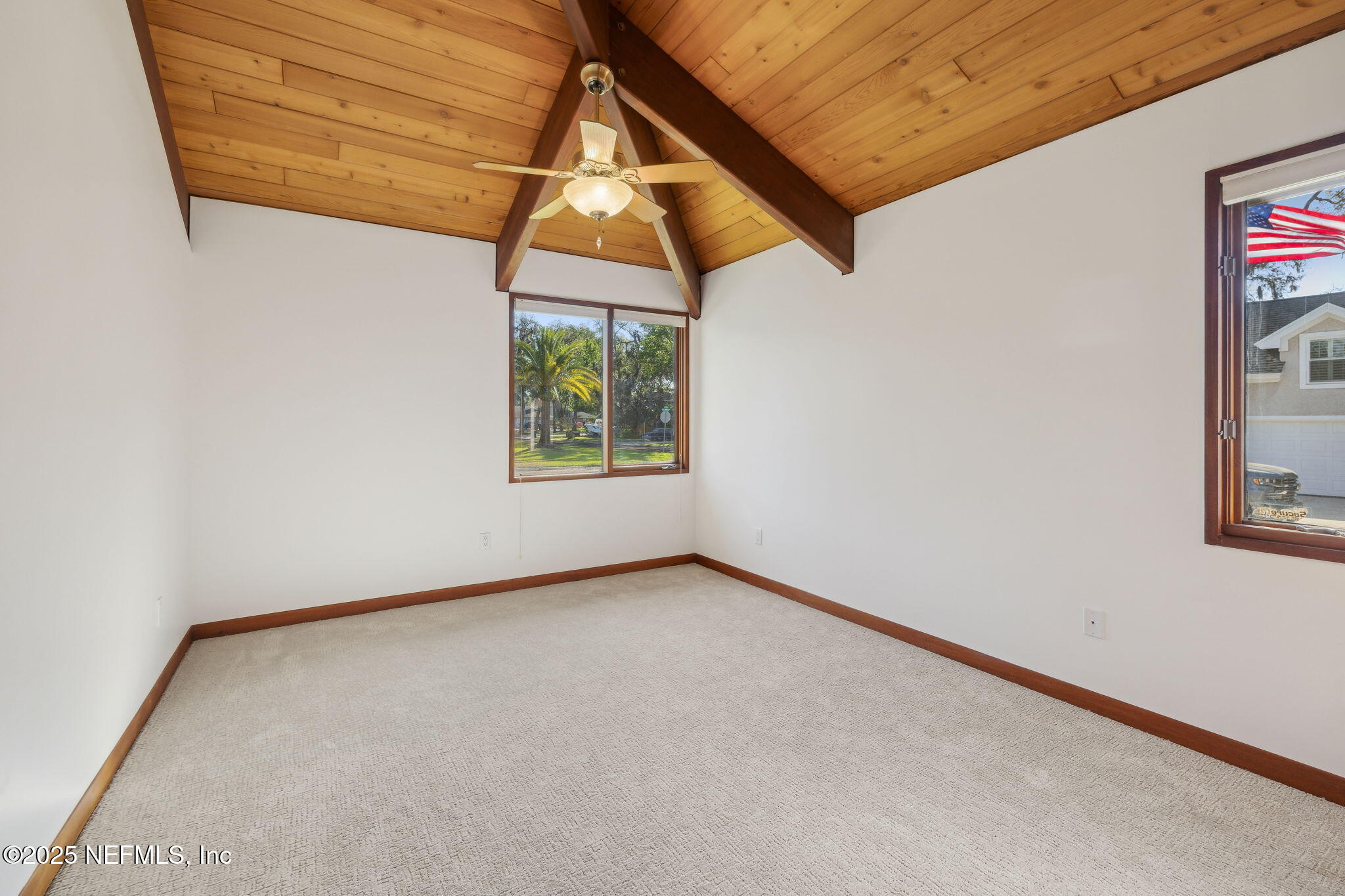 83 Tallwood Road Jacksonville Beach, FL 32250 - Photo 29 of 66 an empty room with windows