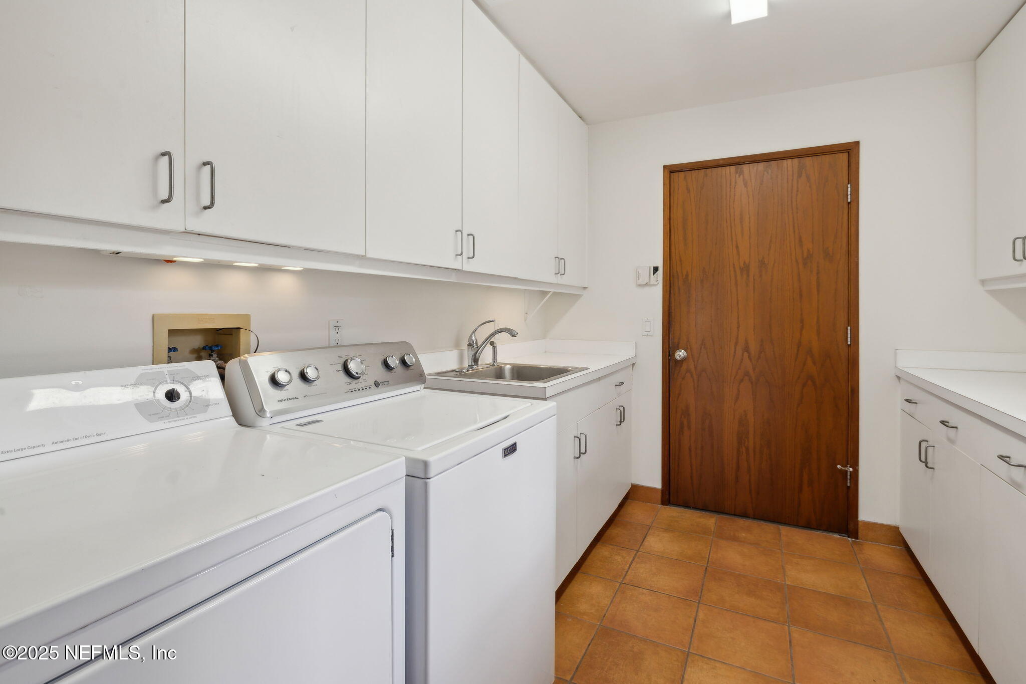 83 Tallwood Road Jacksonville Beach, FL 32250 - Photo 31 of 66 a view of utility room with two washing machine