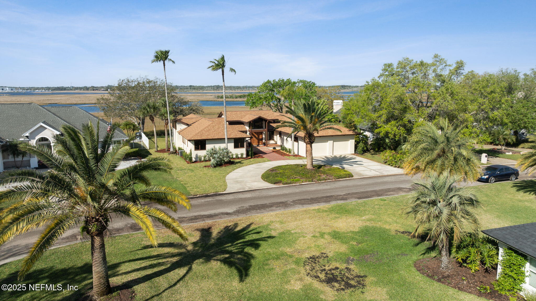 83 Tallwood Road Jacksonville Beach, FL 32250 - Photo 36 of 66 a view of a swimming pool with a yard