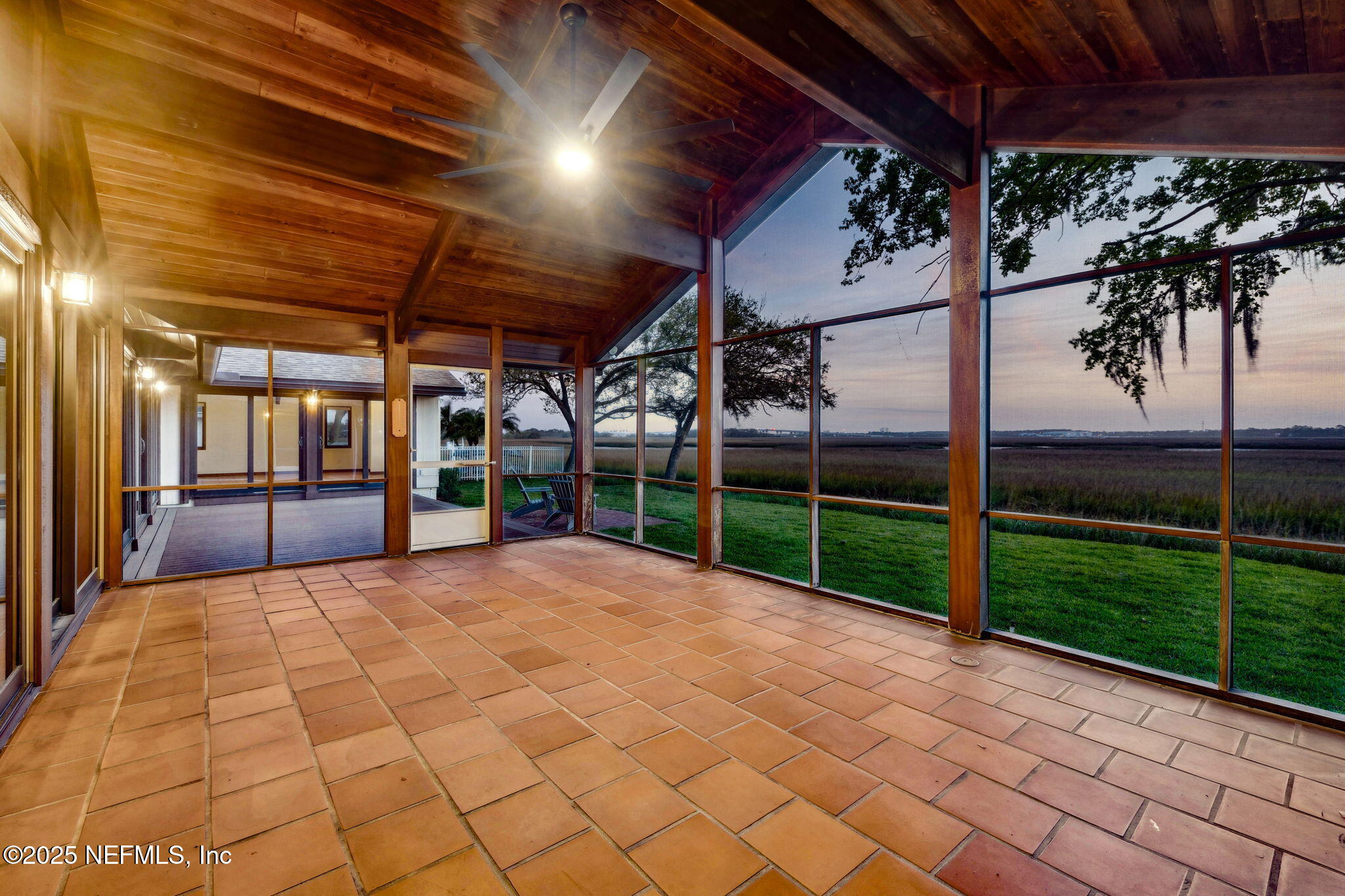 83 Tallwood Road Jacksonville Beach, FL 32250 - Photo 45 of 66 Screened Porch at Sunset