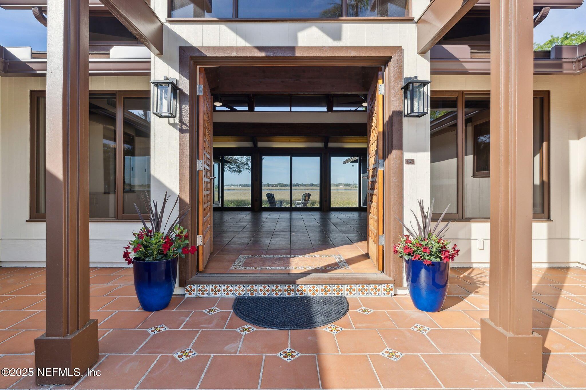 83 Tallwood Road Jacksonville Beach, FL 32250 - Photo 7 of 66 a view of a entryway door front of house