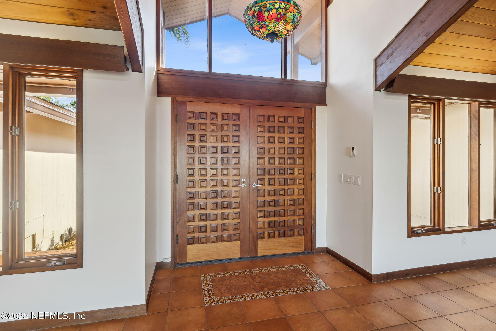 83 Tallwood Road Jacksonville Beach, FL 32250 - Photo 8 of 66 a view of front door with wooden floor