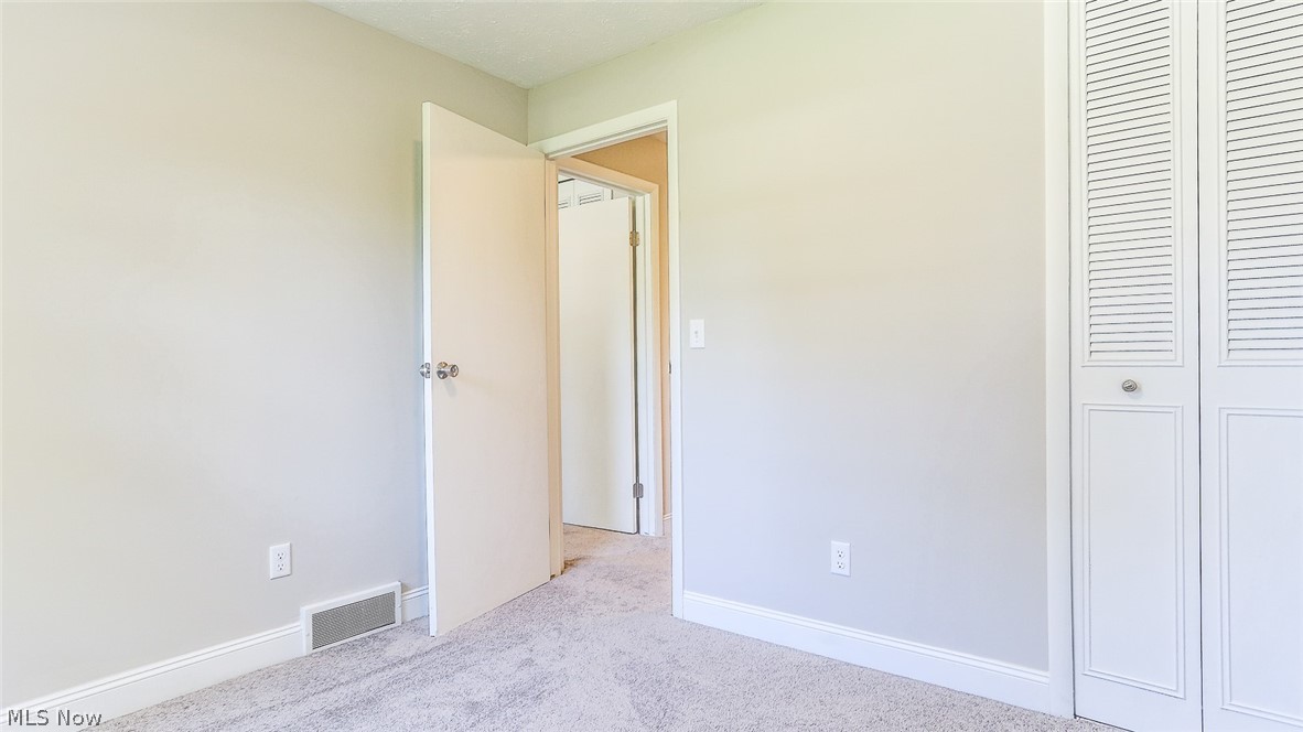 6141 Kungle Road New Franklin, OH 44216 - Photo 24 of 31 *BDRM #3 SOFT CARPET ~