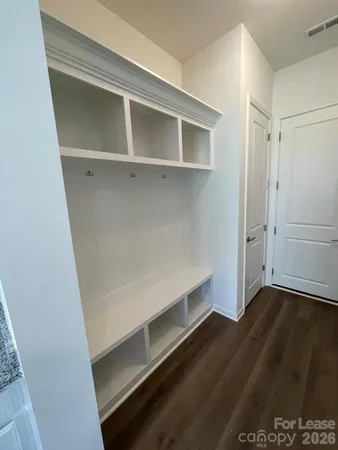 a view of an empty walk in closet