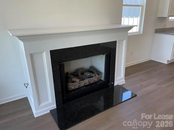 a living room with a fireplace