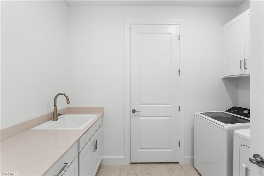 2104 Freemont Way Naples, FL 34119 - Photo 17 of 27 finished laundry room