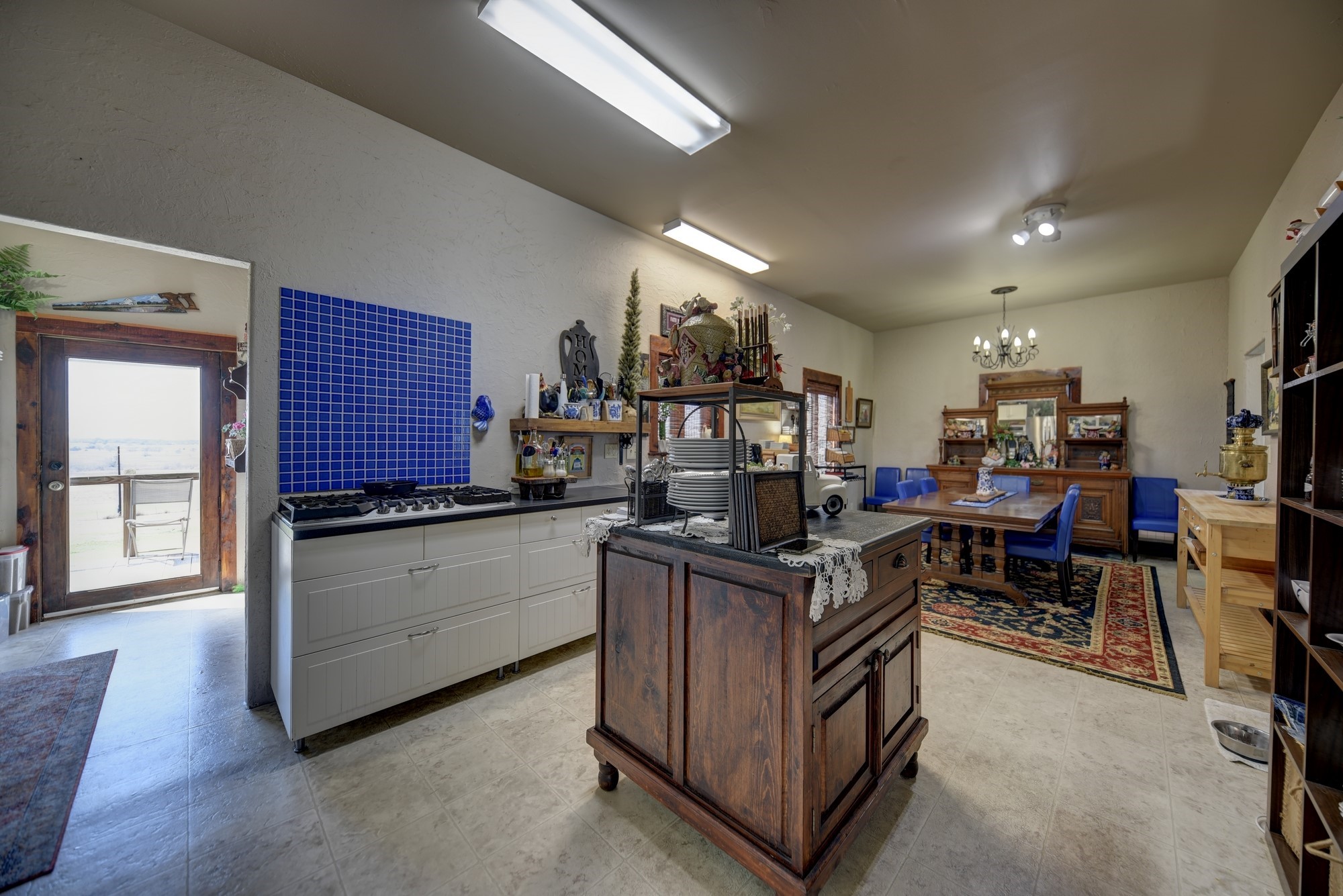 2645 Kallus Road La Grange, TX 78945 - Photo 12 of 25 a kitchen with stainless steel appliances granite countertop a lot of cabinets