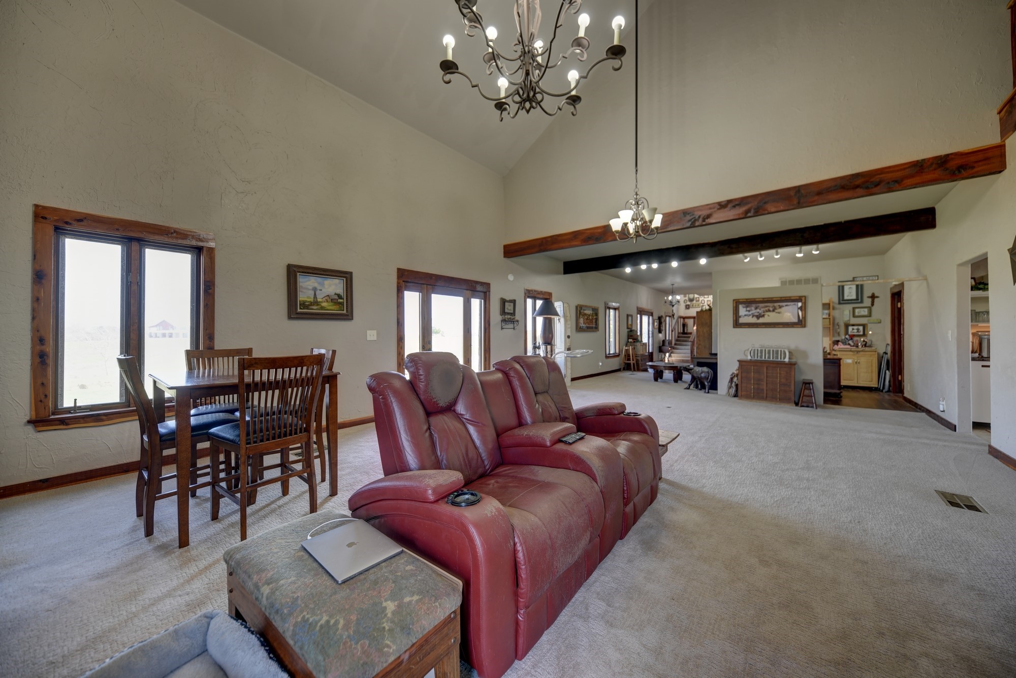 2645 Kallus Road La Grange, TX 78945 - Photo 6 of 25 a living room with furniture a dining table and a chandelier