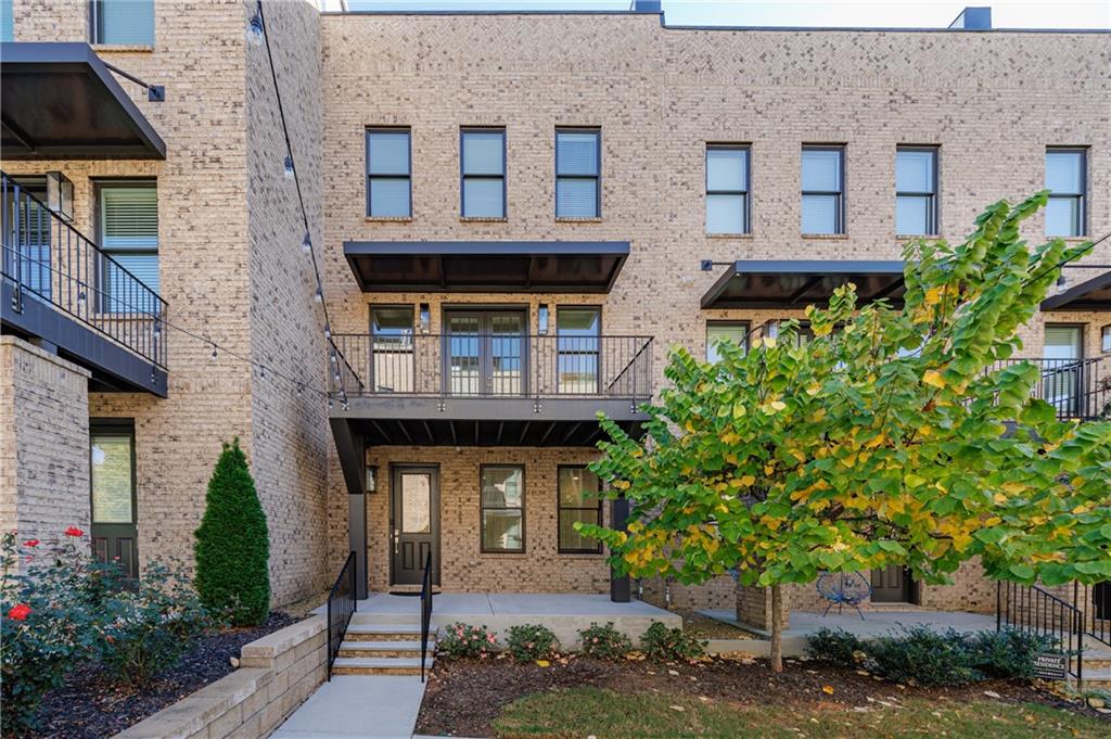 a front view of a multi story residential apartment building