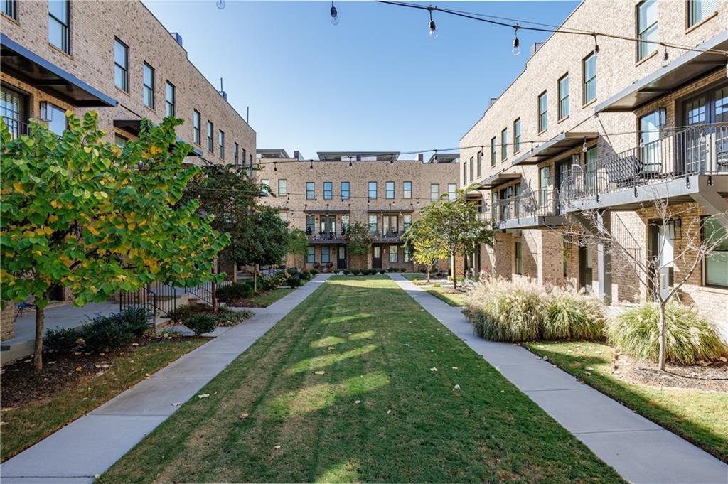 1032 Robert Smalls Way Atlanta, GA 30318 - Photo 13 of 74 a view of a street with a building in the background