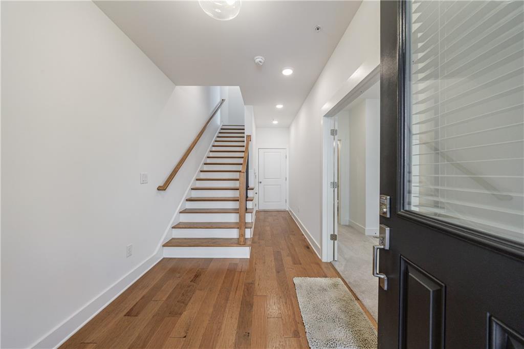 1032 Robert Smalls Way Atlanta, GA 30318 - Photo 15 of 74 a view of entryway and hall with wooden floor