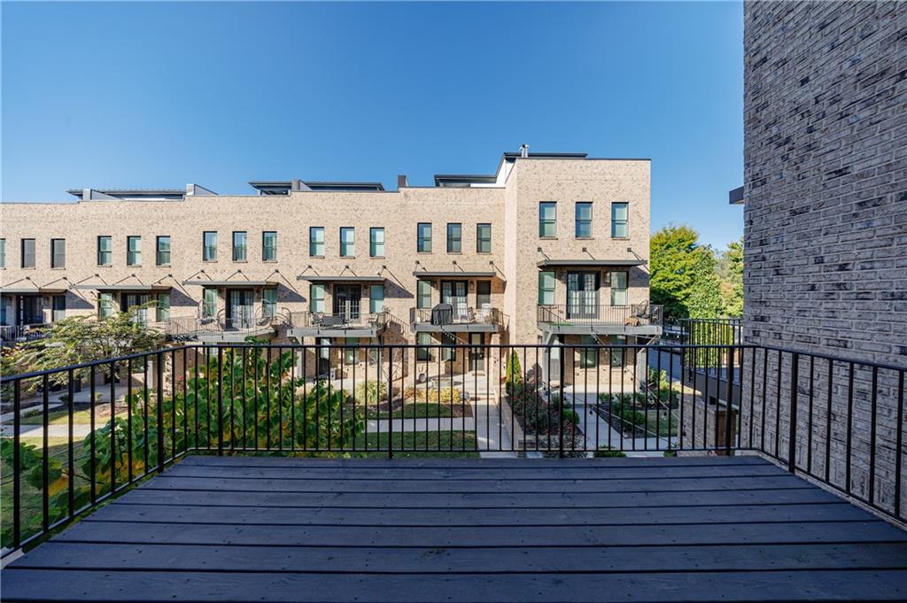 1032 Robert Smalls Way Atlanta, GA 30318 - Photo 31 of 74 a view of a brick house with large windows