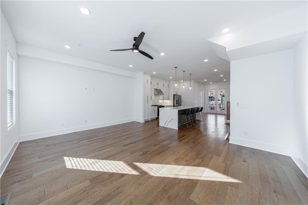 1032 Robert Smalls Way Atlanta, GA 30318 - Photo 34 of 74 a view of kitchen and hall with wooden floor