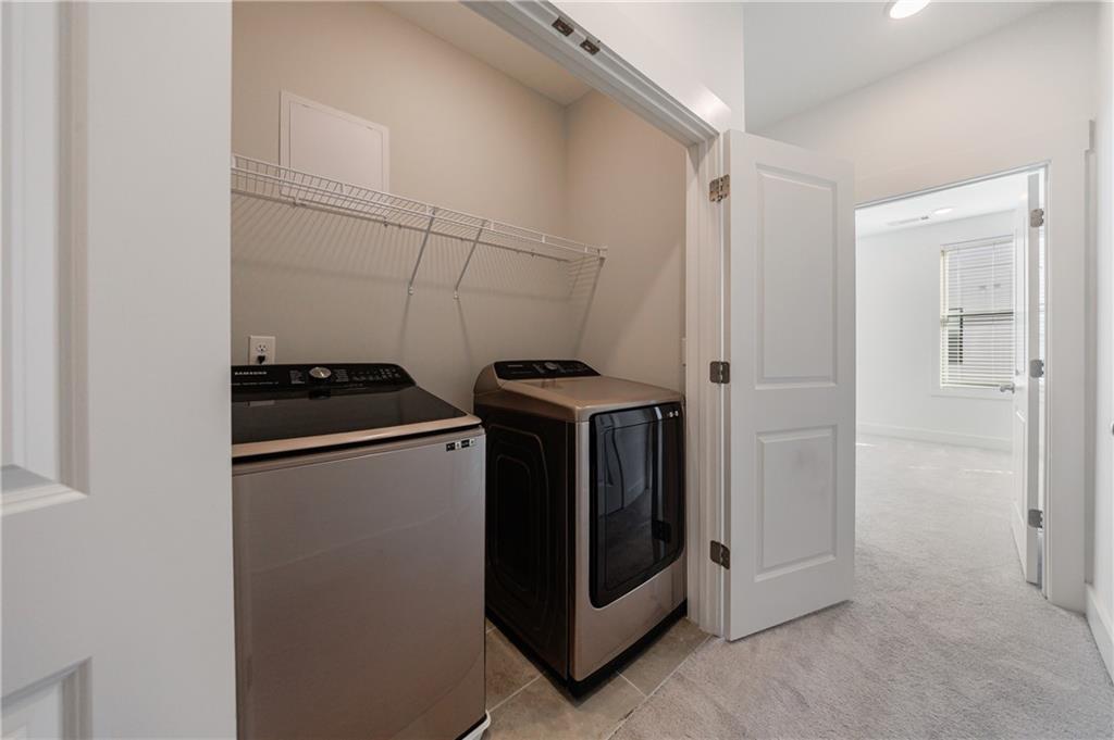 1032 Robert Smalls Way Atlanta, GA 30318 - Photo 52 of 74 a utility room with washer and dryer