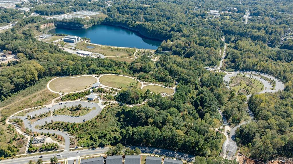 1032 Robert Smalls Way Atlanta, GA 30318 - Photo 66 of 74 an aerial view of a house with a yard and lake view